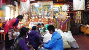 Packing Bags for Gifts at Thaktul Monastery